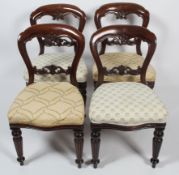 Four Victorian style mahogany balloon back dining chairs,