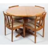 A 'Dyrlund' (Denmark) oak circular extending dining table and six chairs, mid-late 20th century,