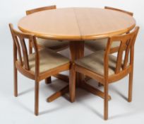 A 'Dyrlund' (Denmark) oak circular extending dining table and six chairs, mid-late 20th century,