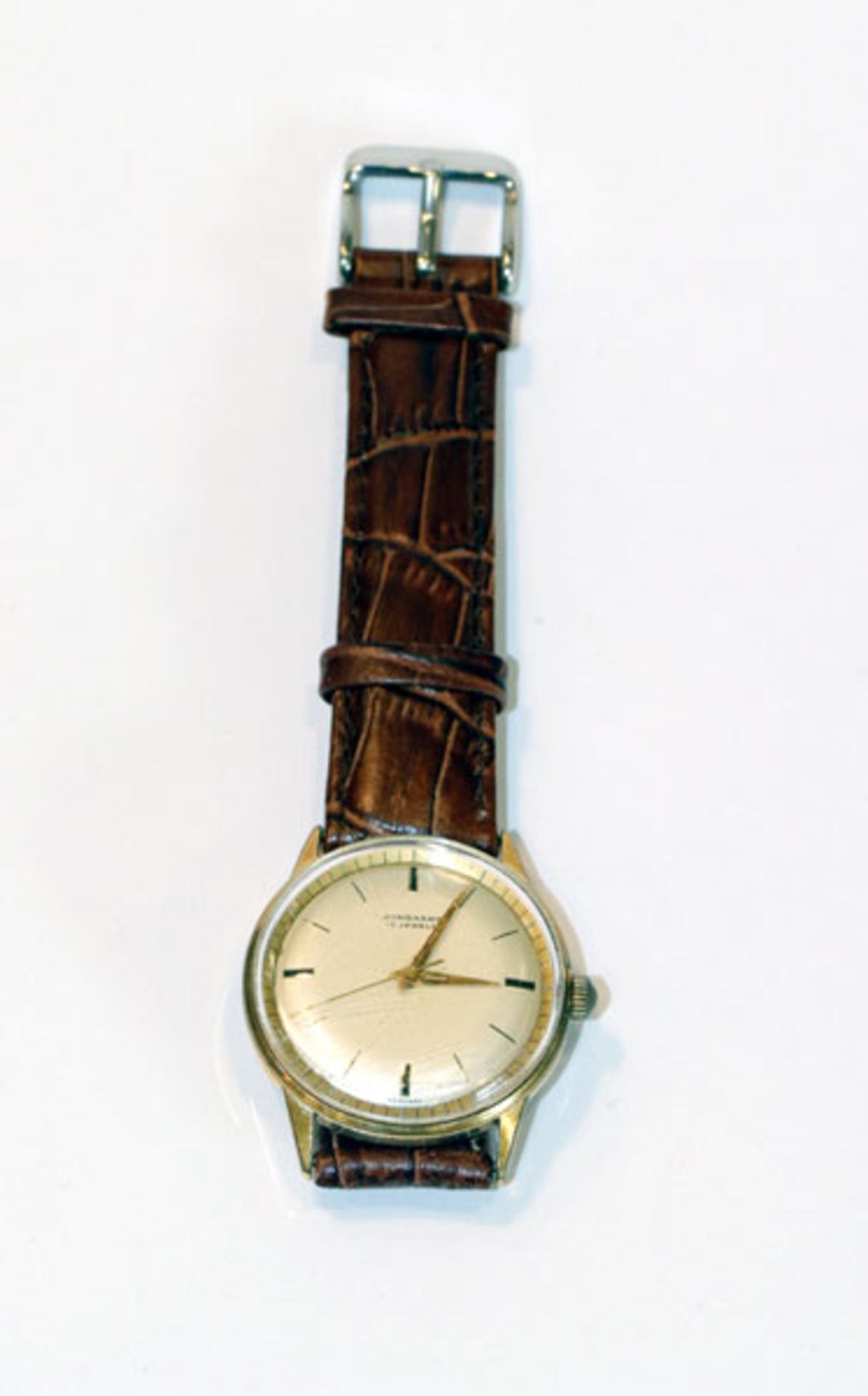 Junghans Herren-Armbanduhr um 1960, intakt, Tragespuren, an braunem, neuwertigem Armband