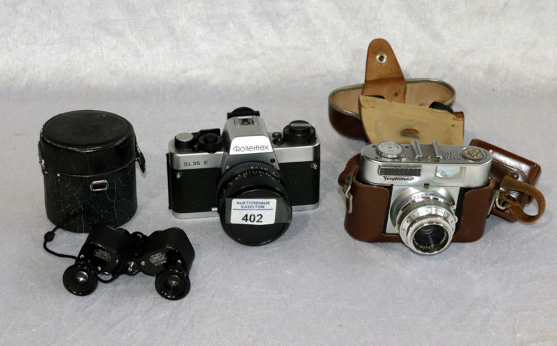 Konvolut: Fotokameras Rolleiflex SL 35 E und Voigtländer Vito BL, und Fernglas Leitz Wetzlar, 3x13,5