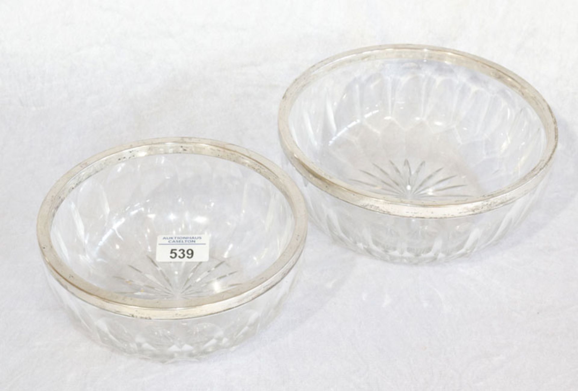 2 Kristallglas Schalen in zwei Größen mit 835 Silberrand, D 16,5/19,5 cm, Gebrauchsspuren