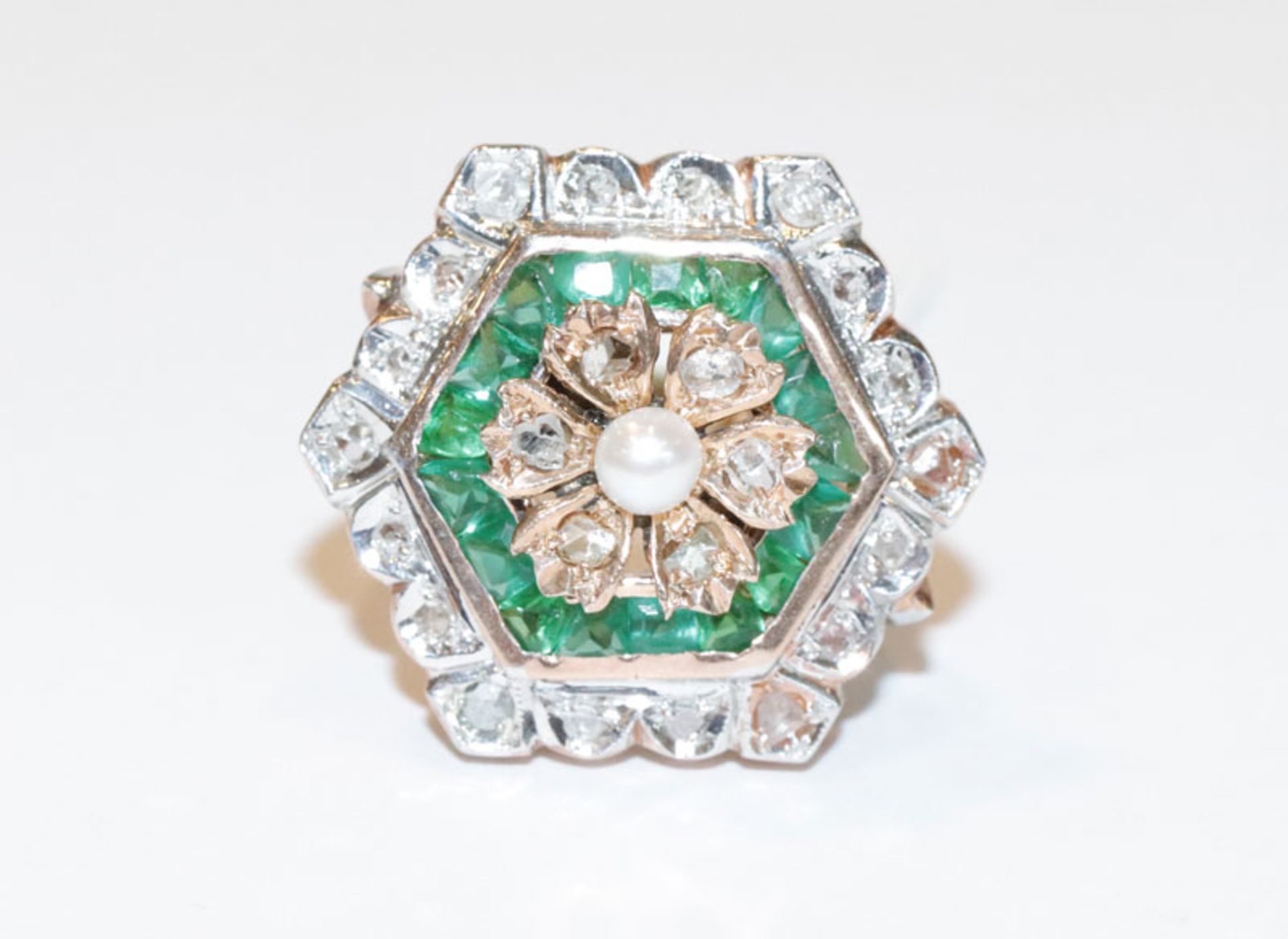 Dekorativer 9 k Roségold/Silber Ring mit 0,15 ct. Diamanten und synthetischen Smaragden,