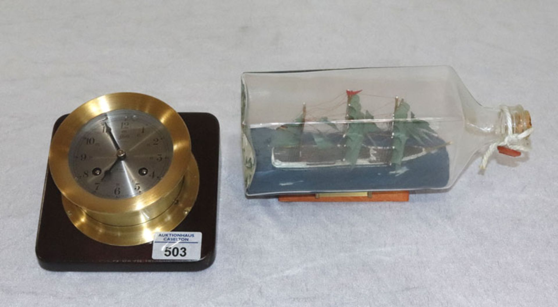 Schatz Ships Bell Tischuhr, H 9 cm, B 14,5 cm, T 14,5 cm, Funktion nicht geprüft, und Bottelship 'A.