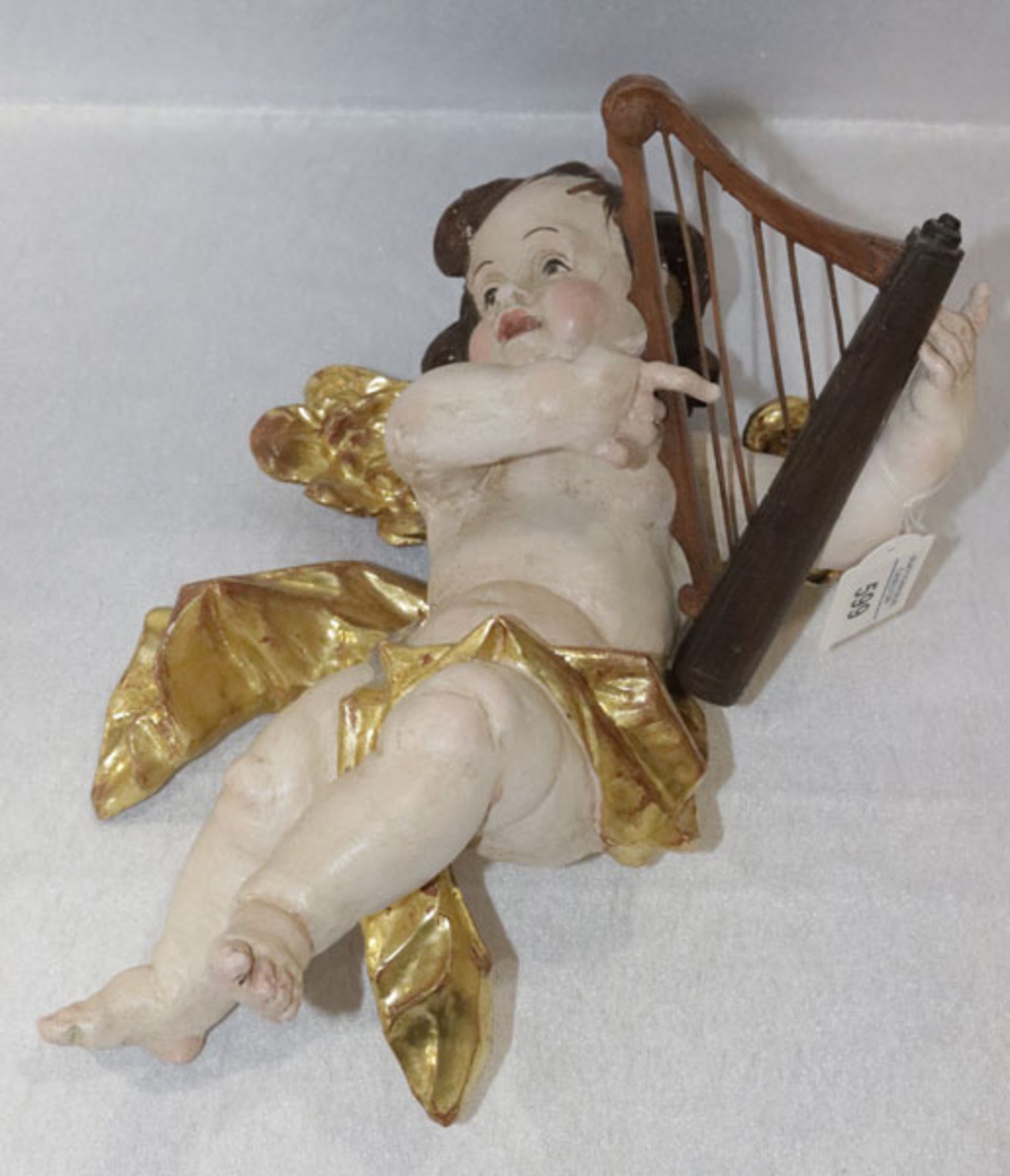 Holz Figurenskulptur 'Engel mit Harfe', farbig gefaßt, H 33 cm, B 24 cm, T 14 cm, leicht berieben