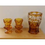 A small pair of 19thC amber flashed Bohemian vases with detailed engraved decoration and one