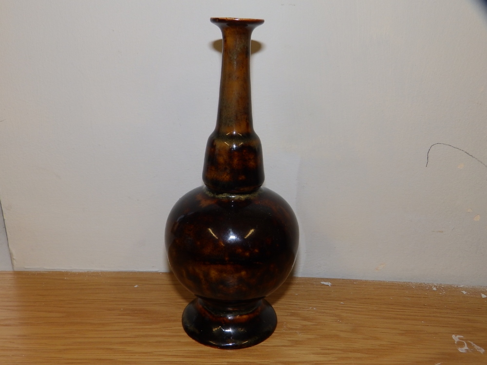 A brown mottled glaze Doulton Lambeth vase.