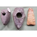Three prehistoric stone tools from Denmark including two pierced battle axes.