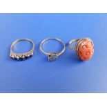 A 9ct coral ring and two others. (3)