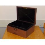 A late Victorian leather covered jewellery/document box with Bramah lock.