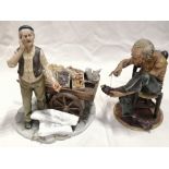 A Capodimonte biscuit porcelain figure of a street seller with cart, 10.5" high - damaged, and a