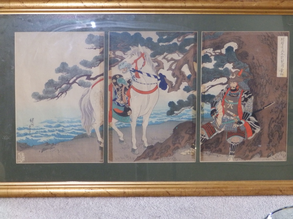 A pair of signed Japanese woodblock colour 'triptych' panel prints, depicting a battle scene and a