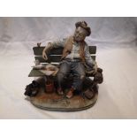 A Capodimonte biscuit porcelain figure of a man feeding the birds, 9" across.