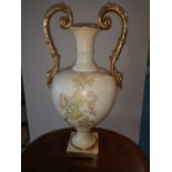 A late 19thC two-handled floral decorated vase , 17" high - handle re-stuck.