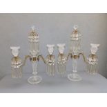 A pair of Regency cut glass & ormolu lustre candelabra, the central column surmounted by a row of