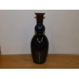 A variegated studio glass vase, 8" high.