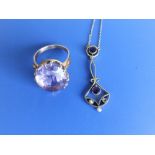 A 9ct amethyst ring and a pendant - one seed pearl missing. (2)