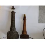 A Cornish serpentine marble lighthouse table lamp, 22" high and a wooden lighthouse lamp. (2)