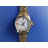 A lady's 18ct gold Rolex Oyster Perpetual Datejust Chronometer bracelet wrist watch, having white