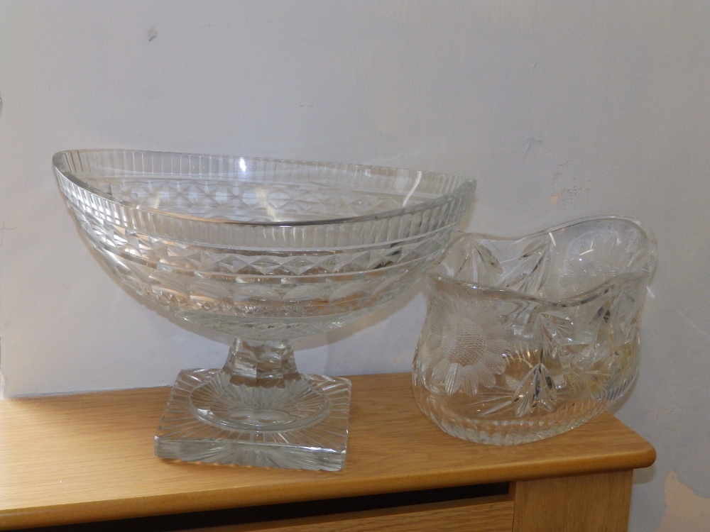 A canoe shaped cut glass pedestal bowl, 12" across and one other. (2)