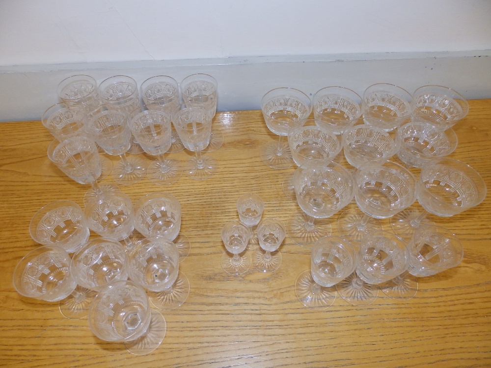 A set of cut glass wines/sherry glasses on star cut bases. - Image 2 of 3