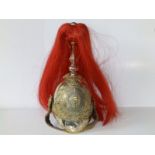 A 1950's British Household Calvary Trooper's full dress helmet with red plume.