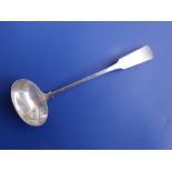 A George III Scottish provincial silver fiddle pattern sauce ladle.
