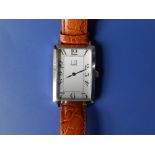 A gent's stainless steel Dunhill rectangular wrist watch in art deco taste on later leather