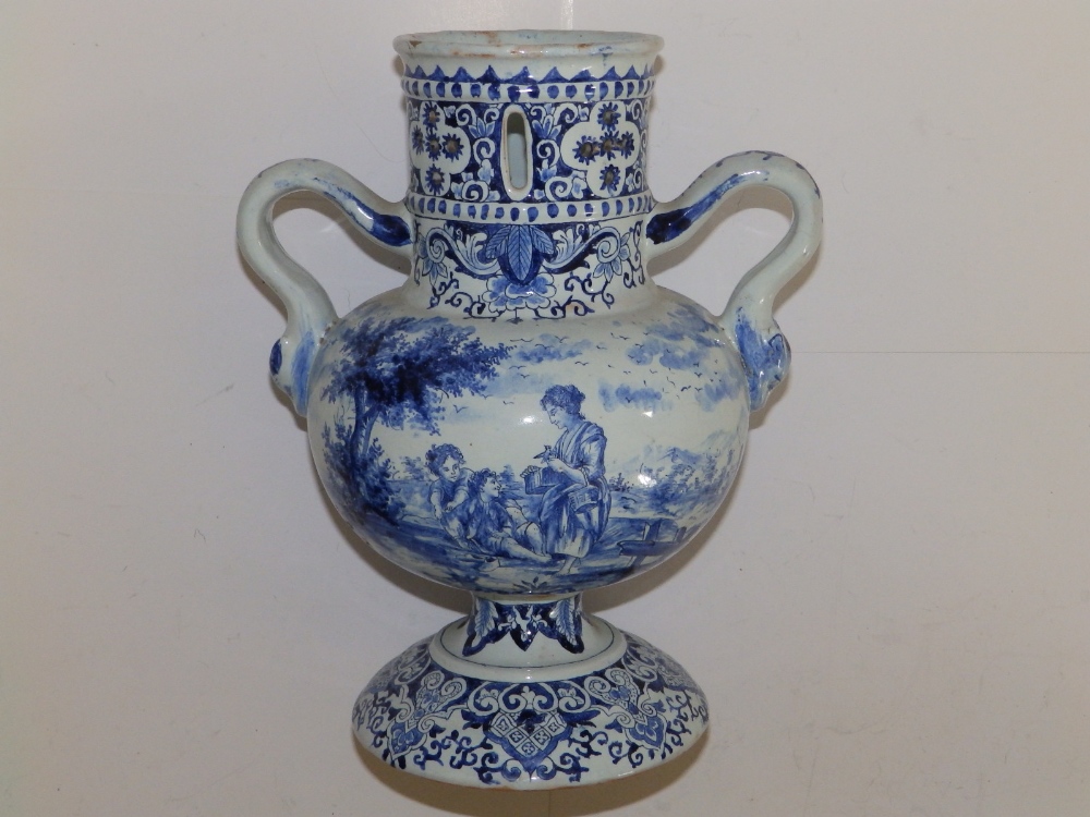 A 19thC delft blue & white two-handled vase, having pierced cylindrical neck, painted with - Image 2 of 4