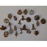 23 military corps cap badges.