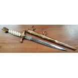 A German WWII German naval dress dagger with Eickhorn blade - some cracking to hilt.