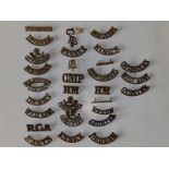 30 military brass shoulder titles.