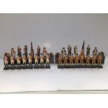 A painted lead military chess set depicting the opposing armies in the American War of Independence,
