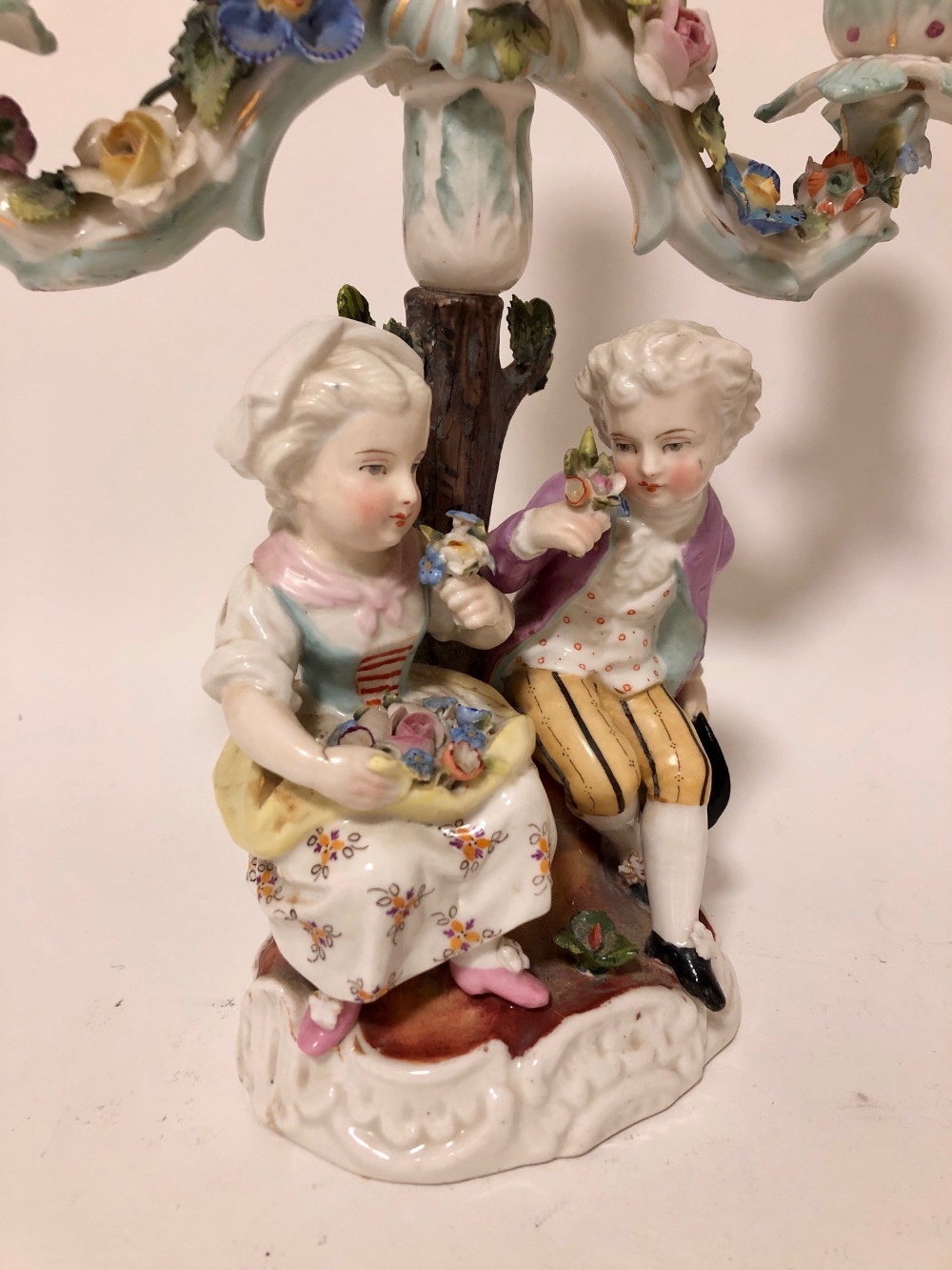 A pair of late 19thC Meissen style porcelain twin branch figural candelabra, underglaze blue scissor - Image 2 of 3