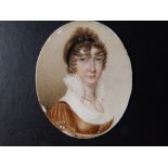 Charles Hayter - An early 19thC oval watercolour miniature - Portrait of a lady in high lace collar,