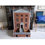 A modern wooden doll's house in the form of a four storey Georgian town house, Overall height 44",