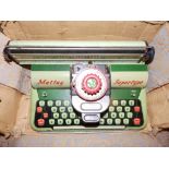 A Mettoy 'Supertype' tinplate typewriter and a boxed Subbuteo set - 'Continental Display