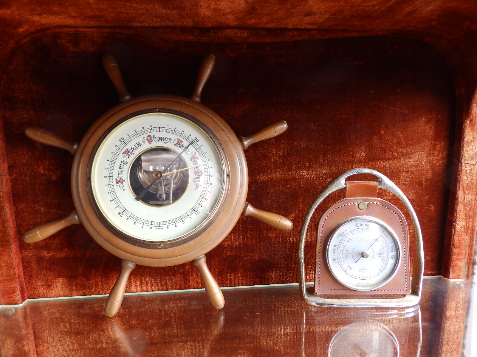 A small 20thC ship's wheel barometer and one other. (2)