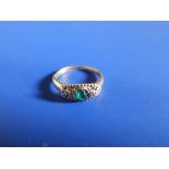 A small Victorian emerald & diamond set ring - tests as 18ct gold. Finger size C/D.