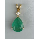 A pear shaped emerald pendant, the claw set stone weighing approximately 2.75 carats in 18ct gold,