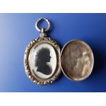 John Miers (1758-1821) - an oval silhouette miniature portrait bust of a young lady with ribbons