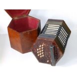 A Victorian rosewood stained hexagonal 'Defiance' concertina by George Jones with 27 ivory keys 7"