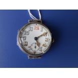 A WWI silver trench watch with white enamel dial luminous hands and traces of luminous paint