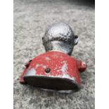 A painted aluminium negro money bank.