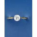 A diamond solitaire ring, the old cut stone weighing approximately 0.50 carat (chipped to girdle),