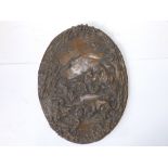 A oval bronze plaque cast in relief with a British wildlife scene - 'Annette '90', 12.5" high.