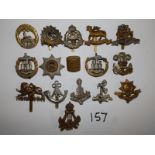 15 various infantry cap badges - including WWI.