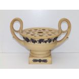 An early 19thC Wedgwood bough pot, of matt caneware colour applied dark brown/black grape vine