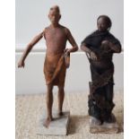 Two antique Indian Poonah clay figures having realistically modelled clothing details, 11" - a/f.