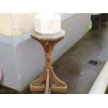 A Victorian carved limestone maritime font on wooden stand, 35" high overall, together with a